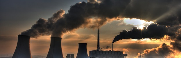 Coal powerplant view - chimneys and fumes